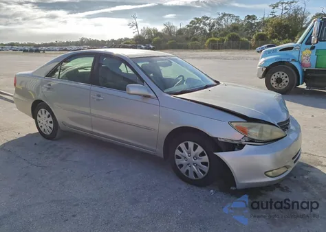 2003 Toyota Camry Le z USA, uszkodzony, nr VIN 4T1BE30KX3U229081